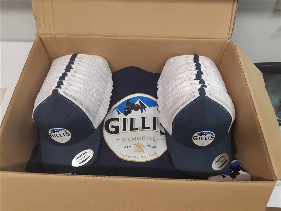 Gillis Memorial ATV Tour caps and shirts boxed for the event