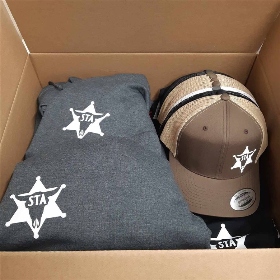 STA hoodies and brown trucker caps with western star logo